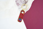 Book Society Gold Enamel Keychain, Dark