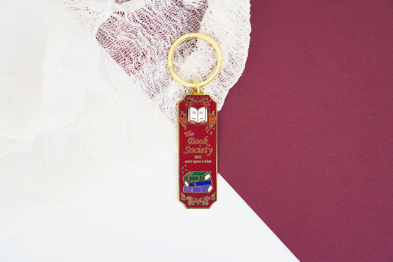 Book Society Gold Enamel Keychain, Dark