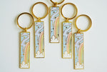 Limited Edition, White Glitter Rainbow Hard Enamel Gold Keychain
